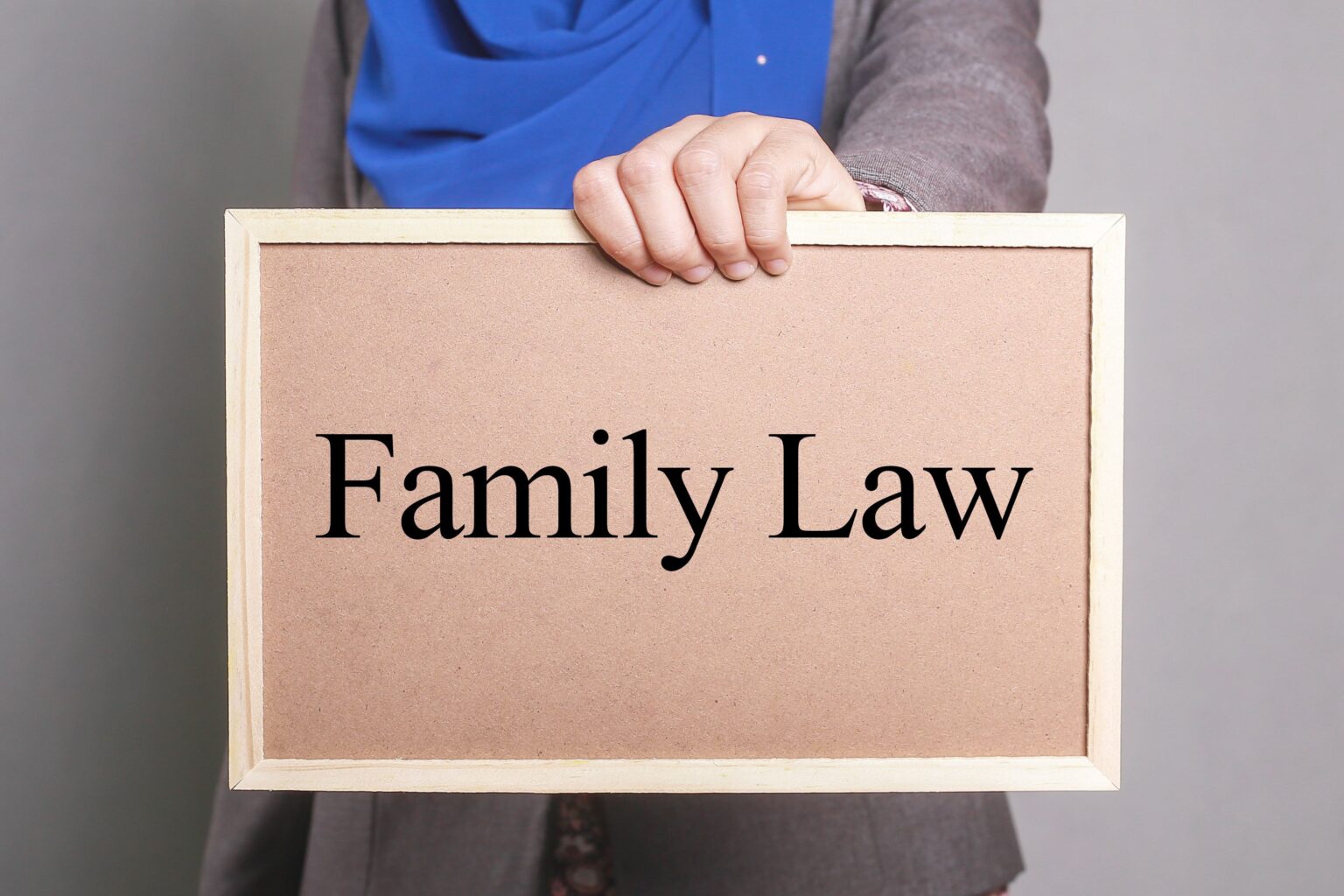 image of hand hold Family Law sign
